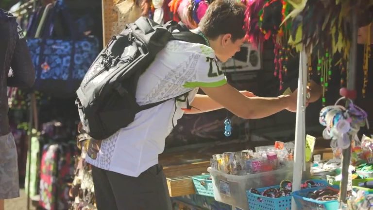 Hawaii Tiki Bowl Athletes shopping at the Aloha Stadium Market